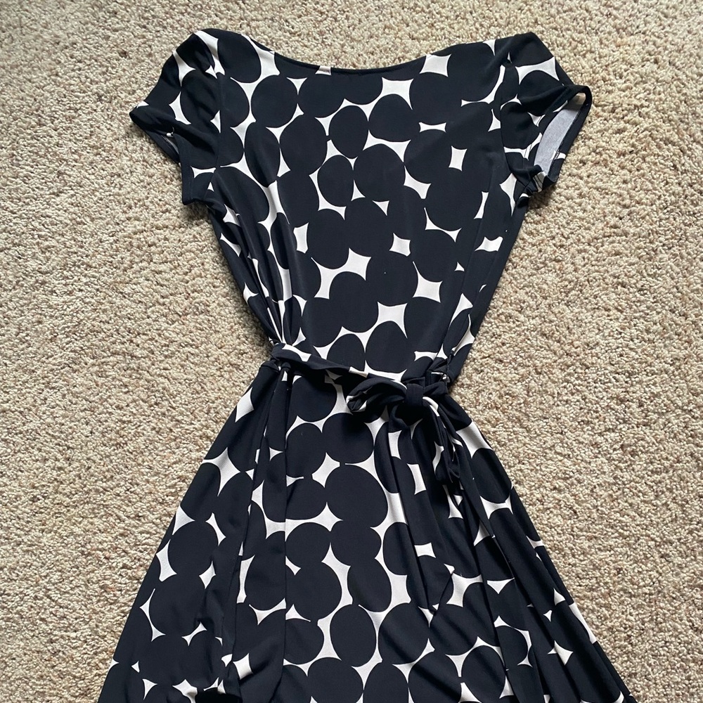 Fun dotted dress that can be worn low cut or high cut